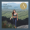 a young woman in yoga clothes standing on a mountainside