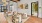 Step into a thoughtfully designed lobby where curated artwork, rich textures, and plush seating offer residents and guests a sophisticated space to relax or connect.