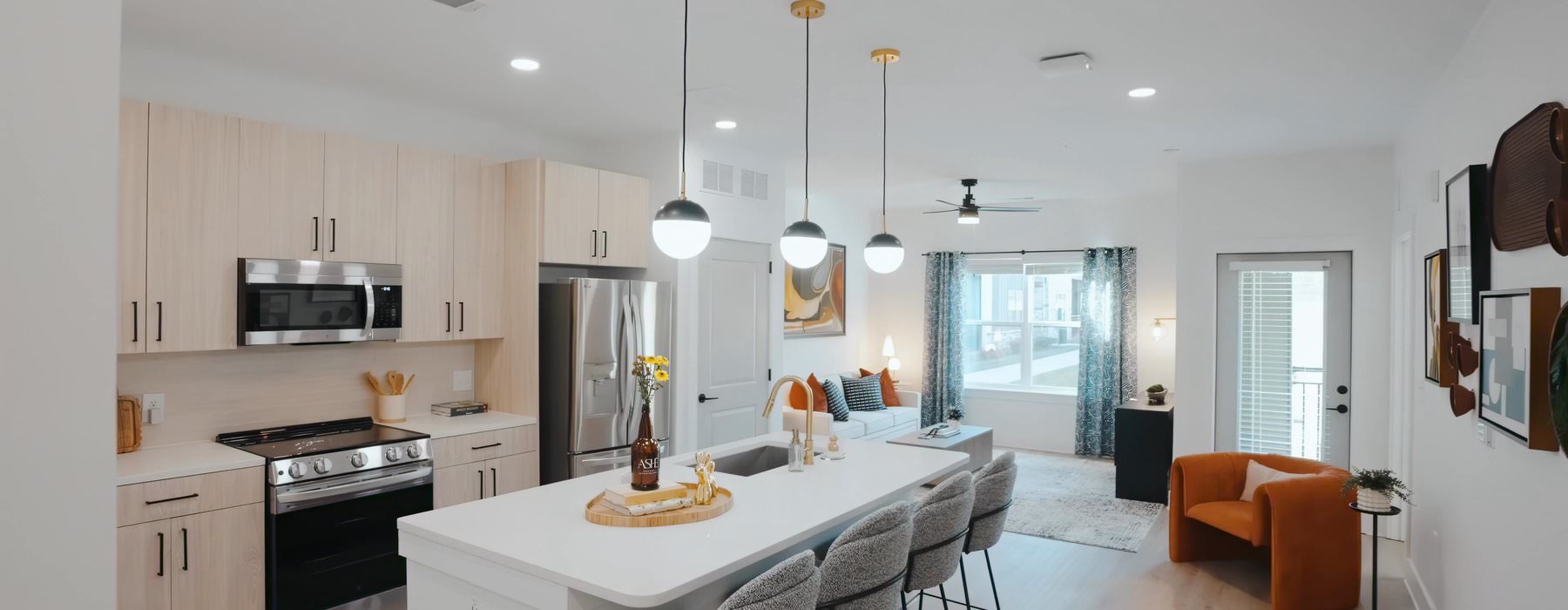 kitchen with an island and bar stools
